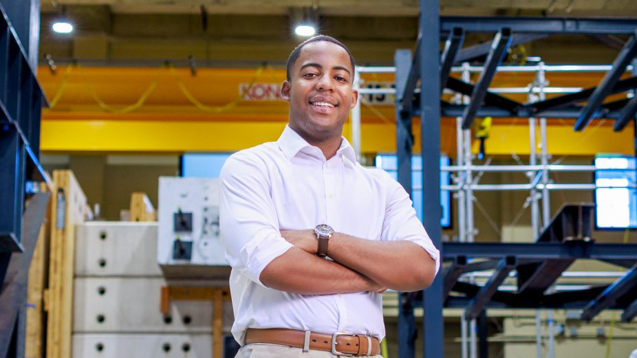 Javen Bies-Dupree poses for a photo in an engineering lab.