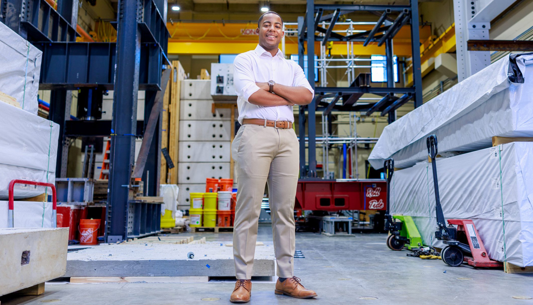 Javen Bies-Dupree poses for a photo in an engineering lab.